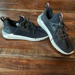 Black UA sneakers with white sole